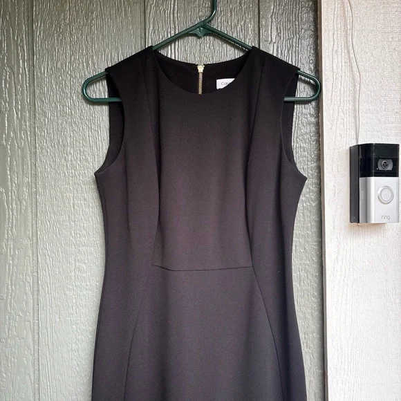 Calvin Klein Black Bodycon Dress | Size 4 | Sleek, Sculpted, Gold Zip Detail - Picture 4 of 10